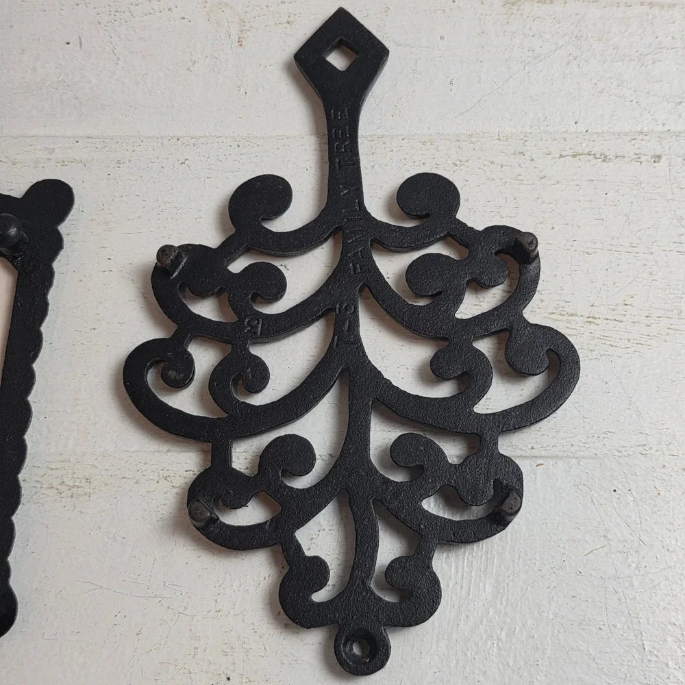 Vintage Cast Iron Trivets 'He Who Helps Shall Eat' Ceramic Tile‎ & Scroll Pair